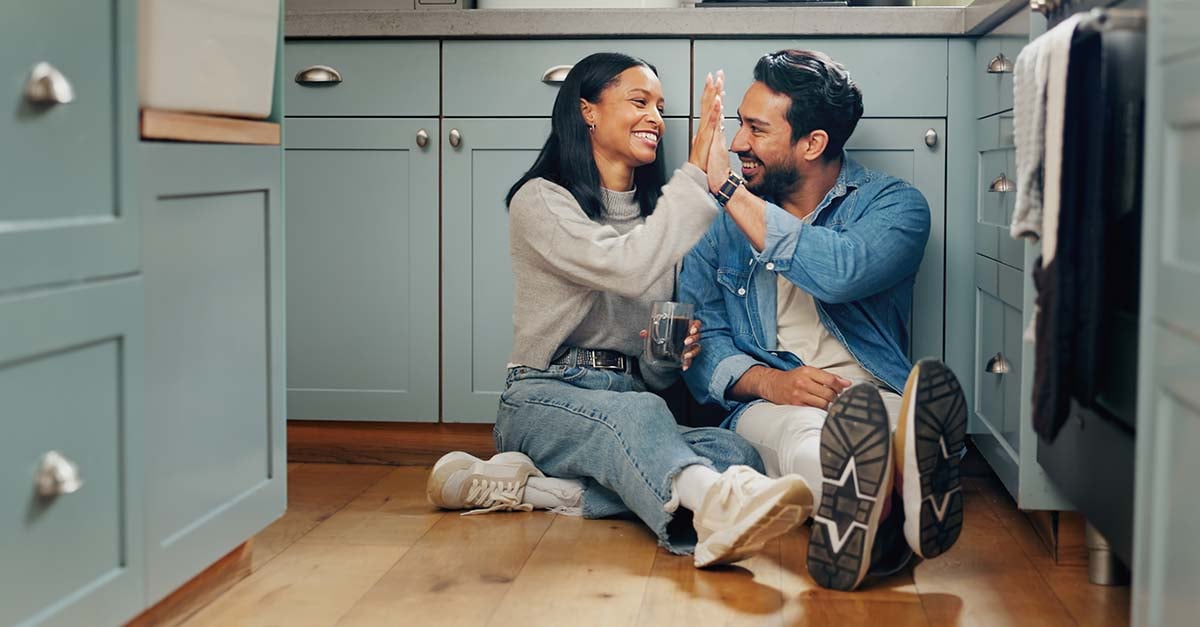 Servicemember and spouse discussing a Florida career plan at home